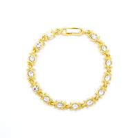Gold tone link bracelet with clear crystals
