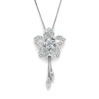 Silver tone flower pendant with clear crystals