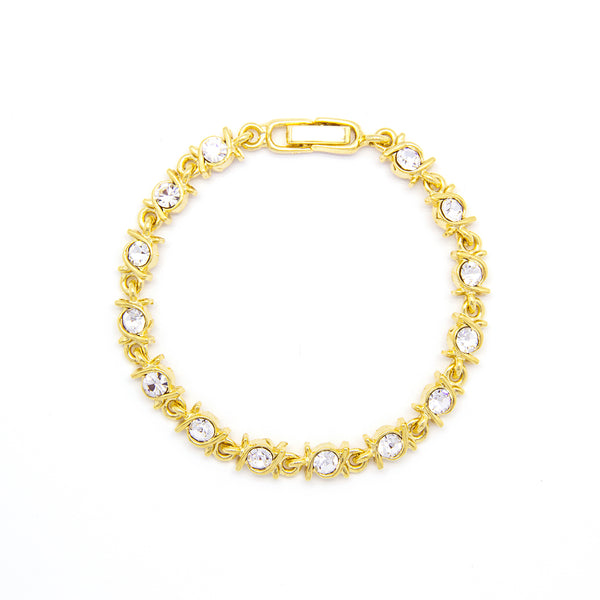Gold tone link bracelet with clear crystals