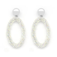 Oval hanging earrings embellished with c