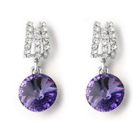 Silver tone petite earrings with purple drop crystal